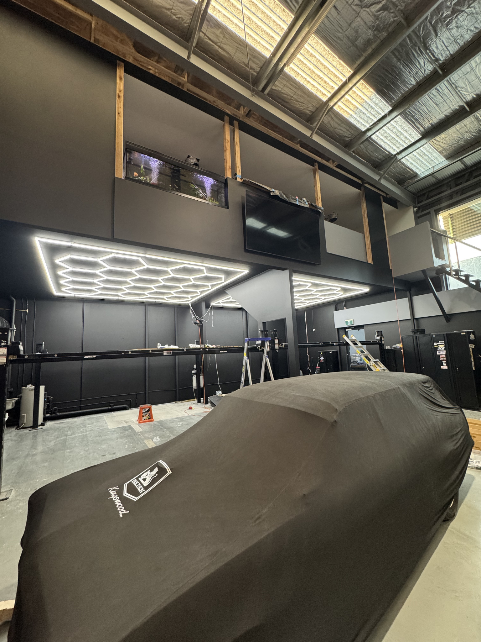 Hexagon LED ceiling lights in commercial gym – Studio Hex Melbourne