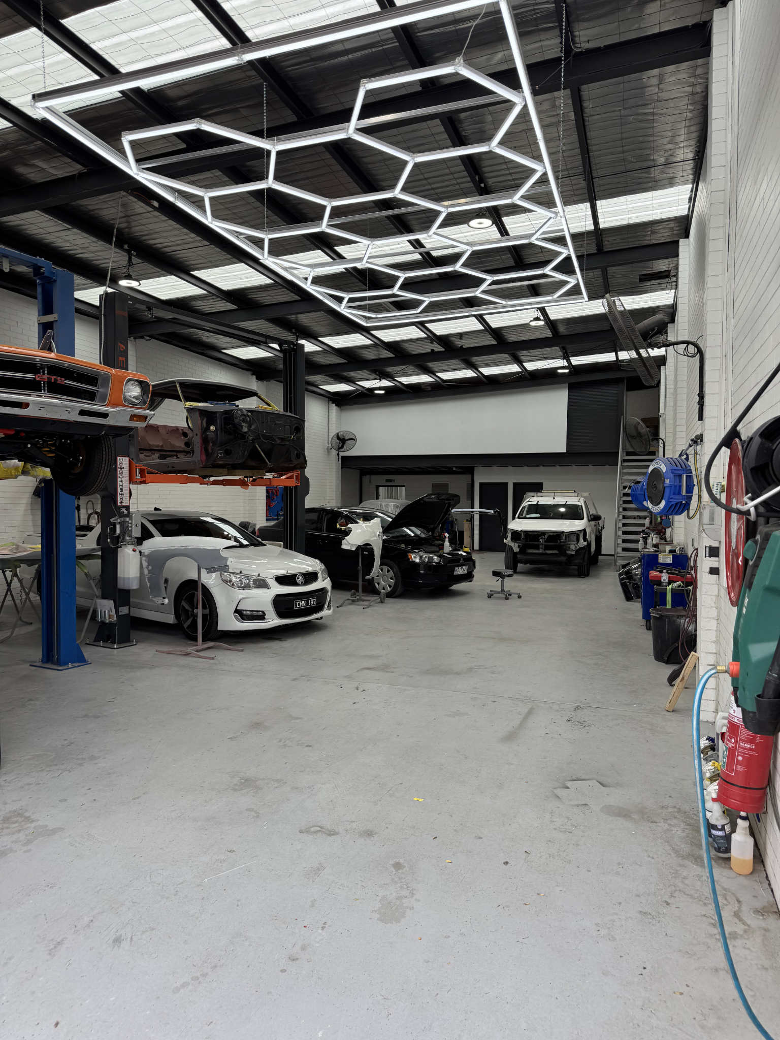 Hex lighting system in auto detailing bay – Studio Hex Tullamarine