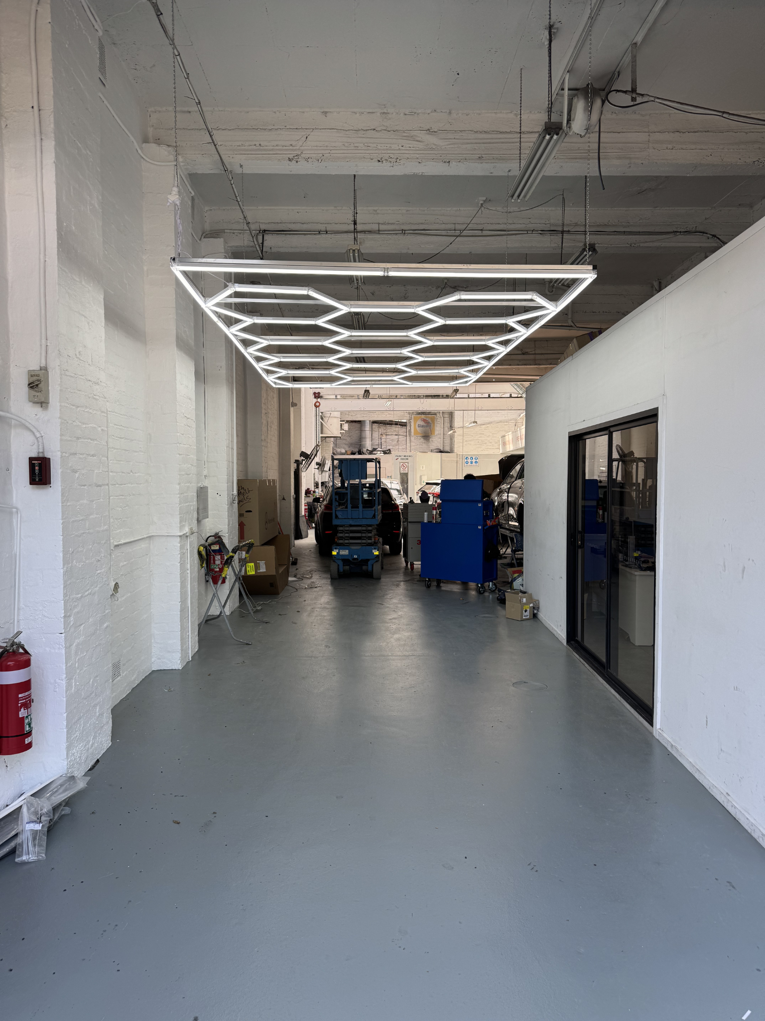 Honeycomb LED lights in warehouse – Studio Hex installation Melbourne